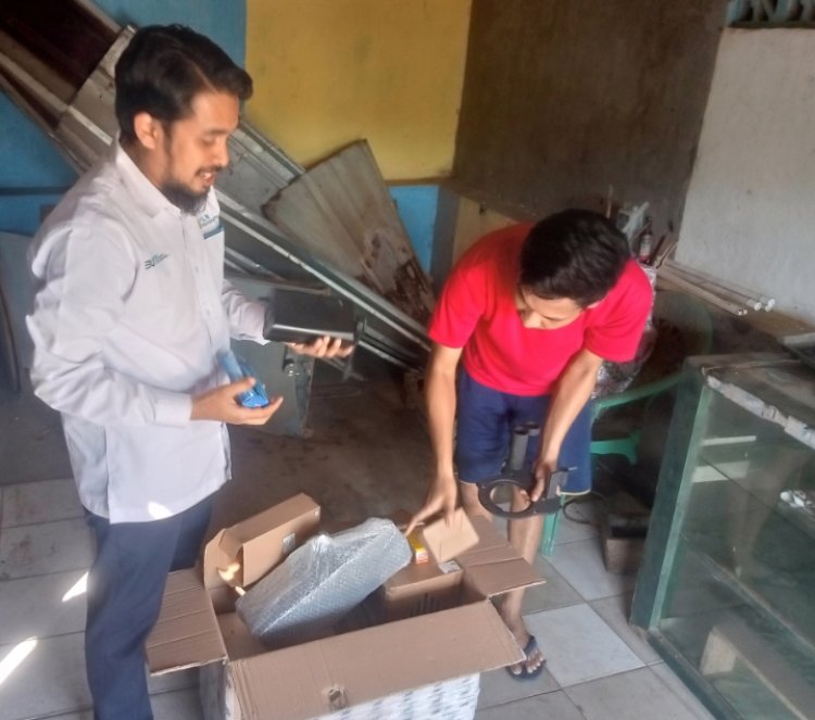 PLTU Banten 2 Labuan serahkan motor konversian BBM ke Listrik pada warga yang Telah Mengikuti pelatihan.
